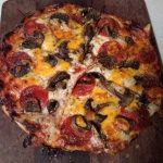 Tortilla pepperoni and mushroom pizza