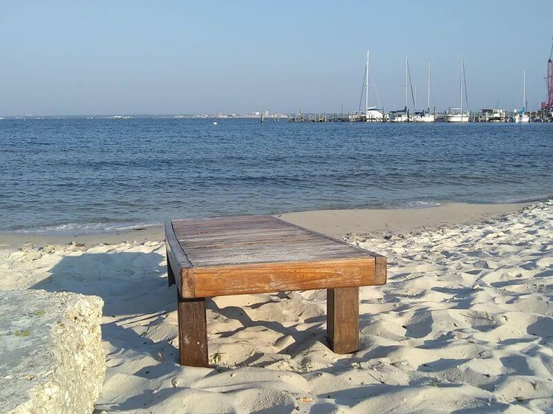 Beach with a lonely bench